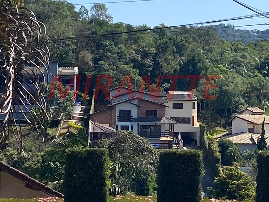 Foto 1 de Casa de Condomínio com 5 Quartos à venda, 530m² em Serra da Cantareira, Mairiporã