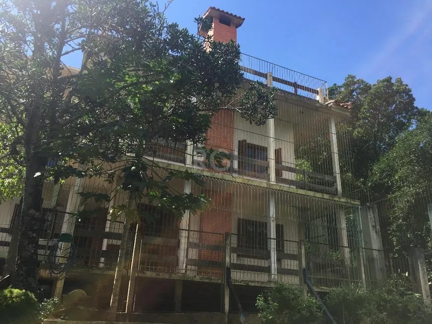 Foto 1 de Casa com 5 Quartos à venda, 387m² em Teresópolis, Porto Alegre