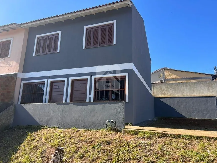 Foto 1 de Casa com 2 Quartos à venda, 66m² em Jardim Fiúza, Viamão