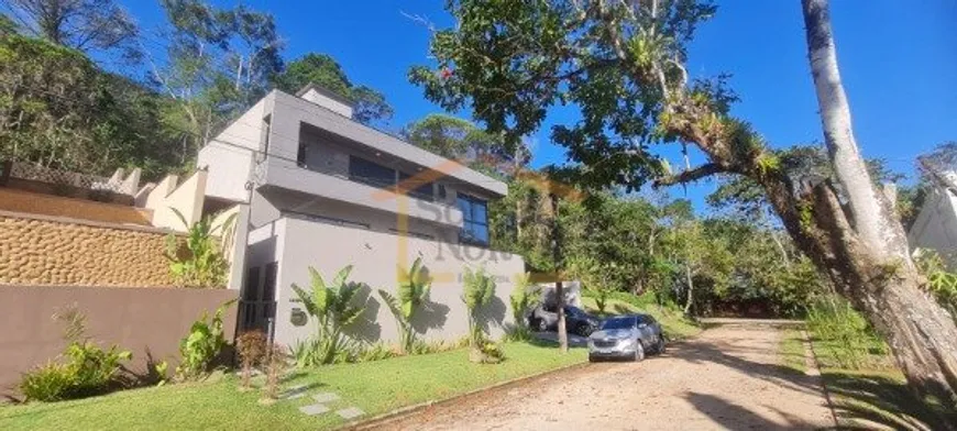 Foto 1 de Casa de Condomínio com 4 Quartos à venda, 230m² em Lagoinha, Ubatuba