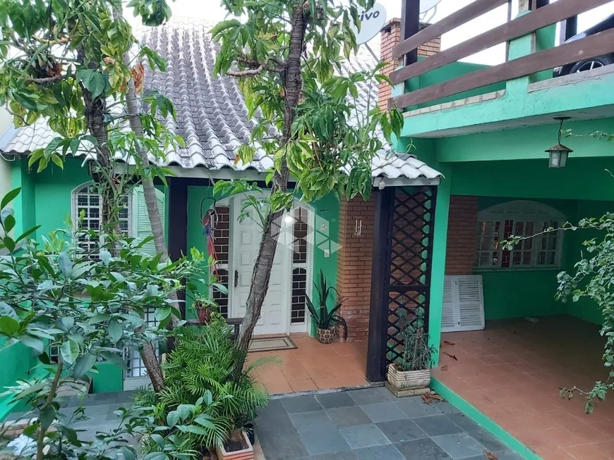 Foto 1 de Casa com 3 Quartos à venda, 260m² em Santa Fé, Porto Alegre