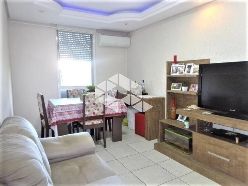 Foto 1 de Apartamento com 3 Quartos à venda, 73m² em Humaitá, Porto Alegre