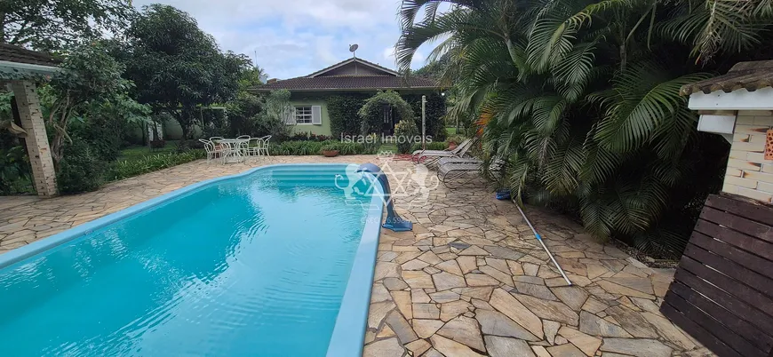 Foto 1 de Fazenda/Sítio com 5 Quartos para venda ou aluguel, 280m² em Massaguaçu, Caraguatatuba