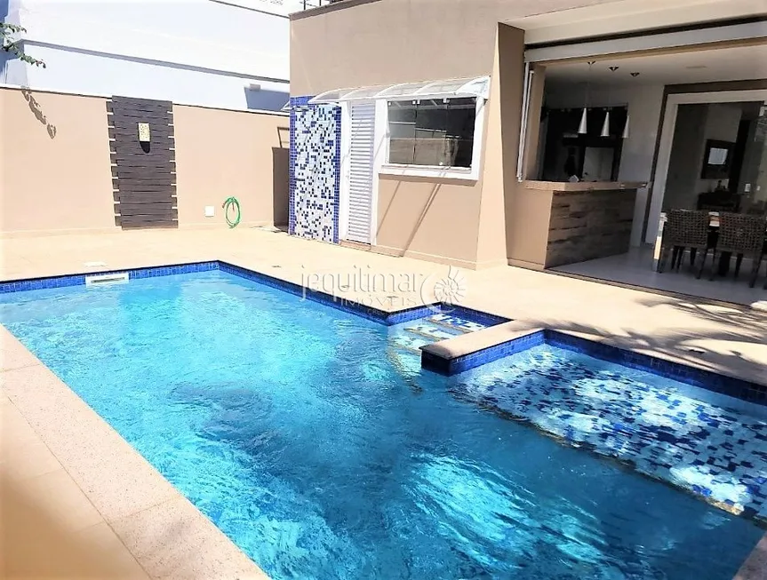 Foto 1 de Casa de Condomínio com 3 Quartos à venda, 295m² em Balneário Praia do Pernambuco, Guarujá