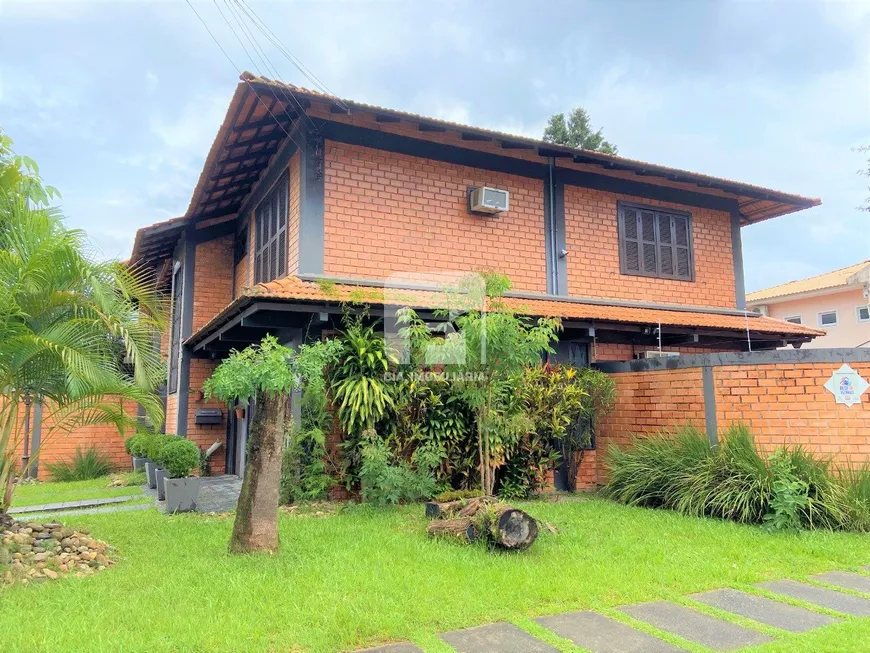 Foto 1 de Casa com 5 Quartos à venda, 550m² em Itacorubi, Florianópolis