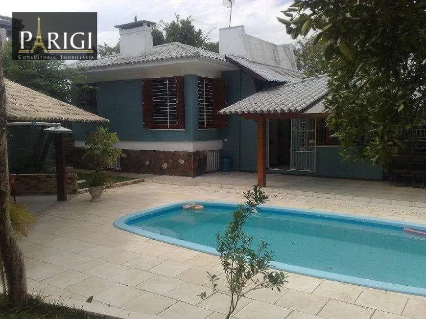 Foto 1 de Casa com 4 Quartos para venda ou aluguel, 304m² em Sarandi, Porto Alegre