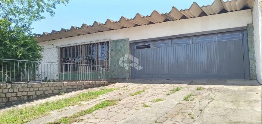 Foto 1 de Casa com 4 Quartos à venda, 256m² em Cavalhada, Porto Alegre