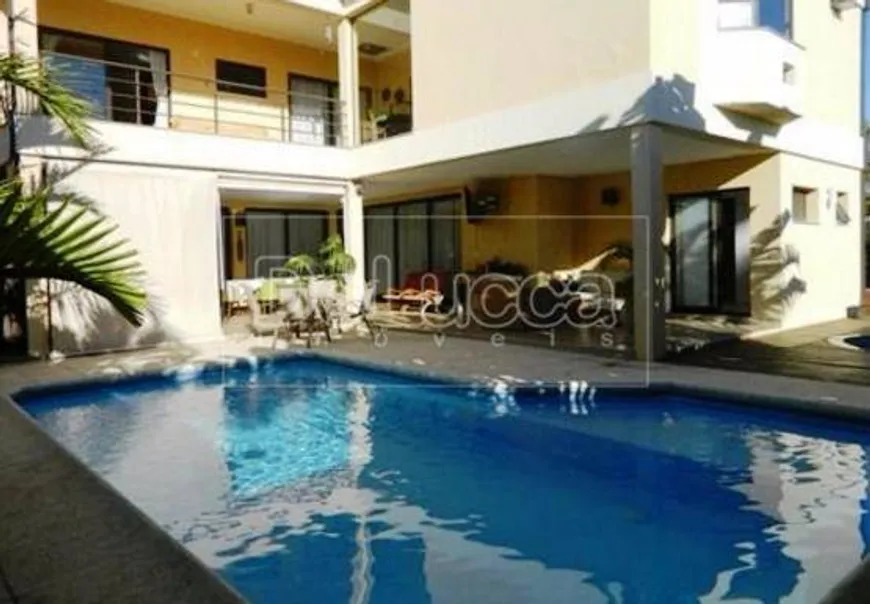 Foto 1 de Casa de Condomínio com 5 Quartos para venda ou aluguel, 522m² em Loteamento Alphaville Campinas, Campinas