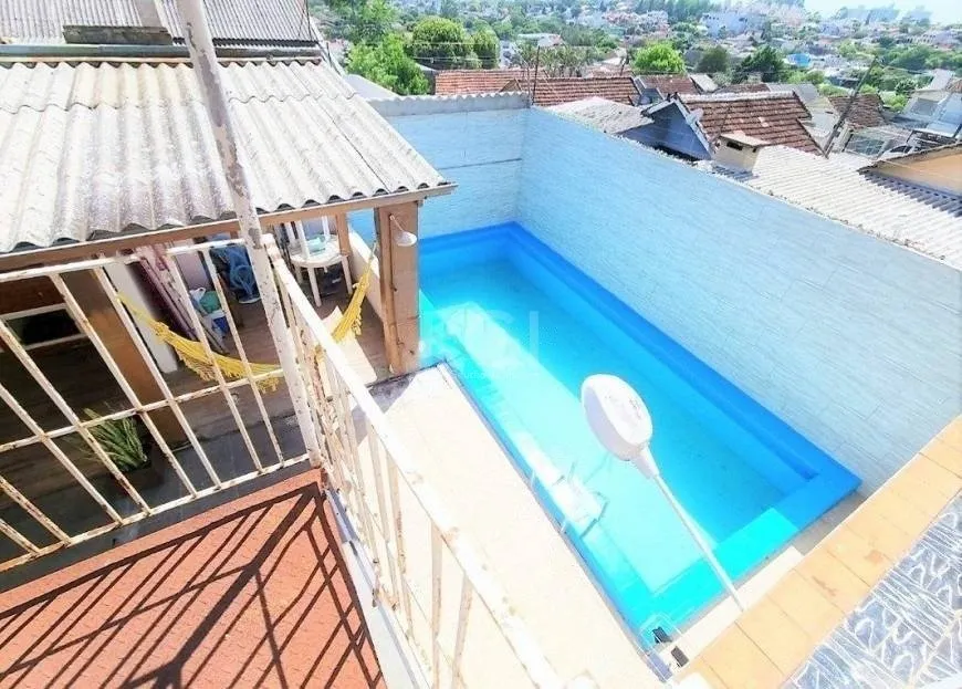 Foto 1 de Casa com 3 Quartos à venda, 252m² em Jardim Itú Sabará, Porto Alegre