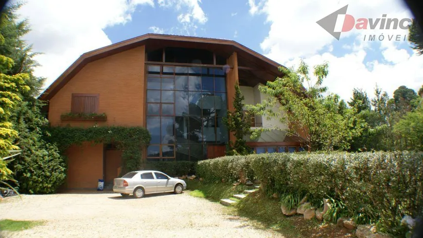 Foto 1 de Casa de Condomínio com 5 Quartos para venda ou aluguel, 590m² em Loteamento Veu da Noiva, Campos do Jordão