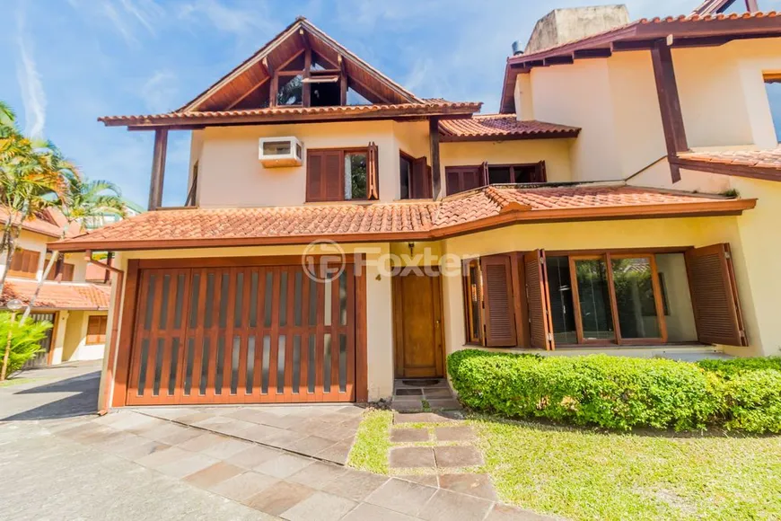 Foto 1 de Casa de Condomínio com 3 Quartos à venda, 391m² em Petrópolis, Porto Alegre