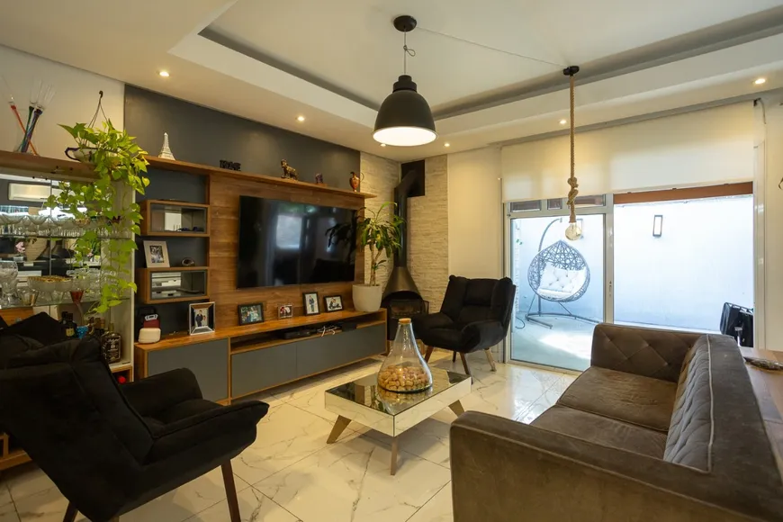 Foto 1 de Casa de Condomínio com 5 Quartos à venda, 257m² em Jardim Carvalho, Porto Alegre