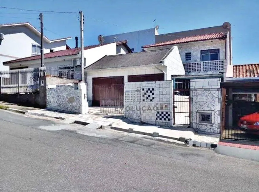 Foto 1 de Casa com 4 Quartos à venda, 140m² em Forquilhas, São José