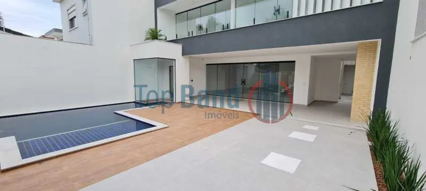 Foto 1 de Casa de Condomínio com 3 Quartos à venda, 370m² em Recreio Dos Bandeirantes, Rio de Janeiro
