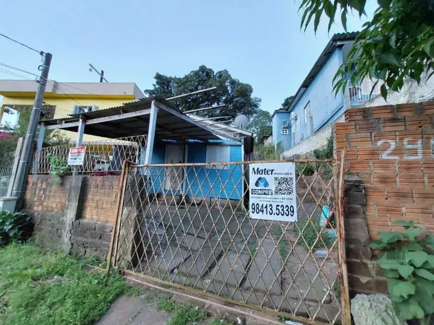 Foto 1 de Casa com 2 Quartos à venda, 198m² em Vila Nova, Porto Alegre