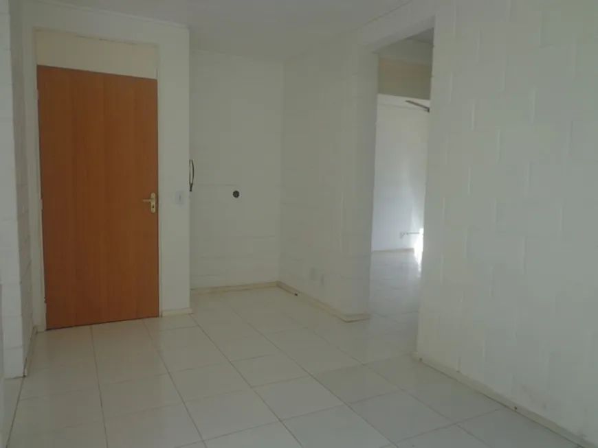 Foto 1 de Apartamento com 2 Quartos à venda, 52m² em Vila Nova, Porto Alegre