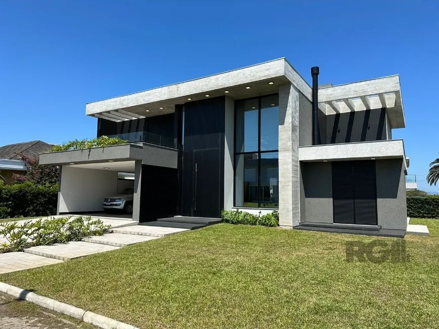 Foto 1 de Casa de Condomínio com 4 Quartos à venda, 380m² em Atlantida, Xangri-lá