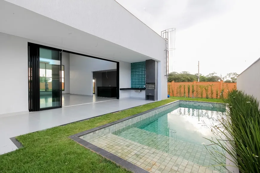 Foto 1 de Casa de Condomínio com 4 Quartos à venda, 319m² em PORTAL DO SOL GREEN, Goiânia