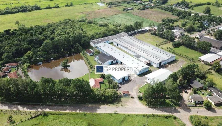 Foto 1 de Galpão/Depósito/Armazém à venda, 10010m² em Centro, Praia Grande