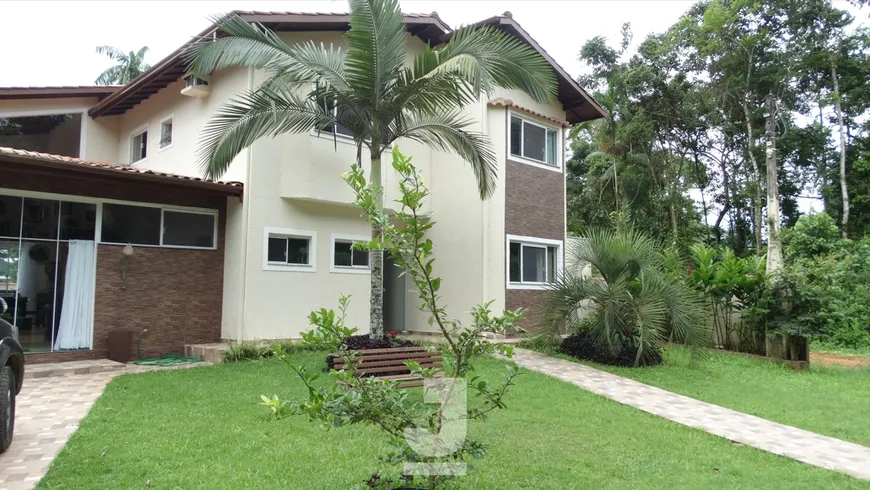 Foto 1 de Casa de Condomínio com 4 Quartos à venda, 355m² em Mar Verde II, Caraguatatuba