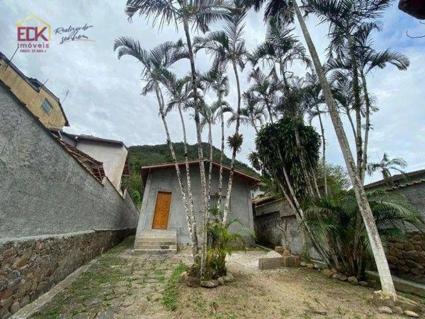 Foto 1 de Casa com 4 Quartos à venda, 100m² em Cidade Jardim, Caraguatatuba