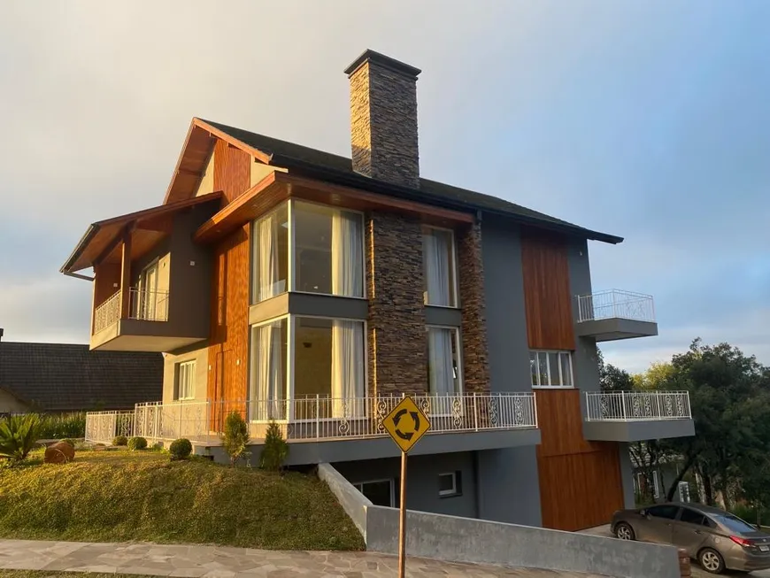 Foto 1 de Casa com 5 Quartos à venda, 373m² em Vivendas do Arvoredo, Gramado