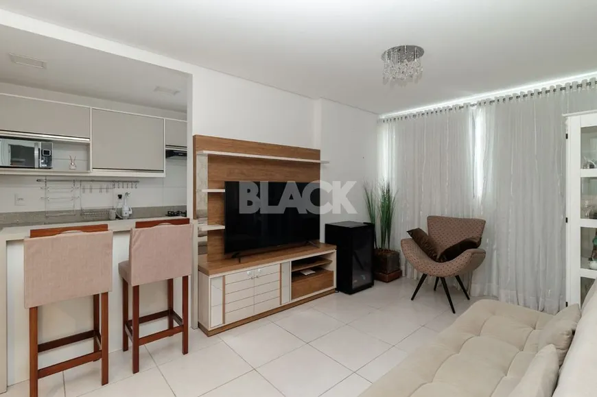 Foto 1 de Apartamento com 2 Quartos à venda, 59m² em Igra sul, Torres