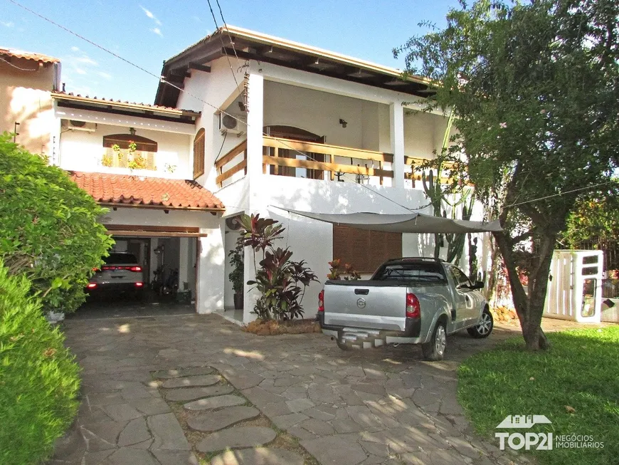 Foto 1 de Casa com 5 Quartos à venda, 225m² em Cavalhada, Porto Alegre
