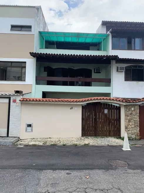 Foto 1 de Casa com 4 Quartos à venda, 210m² em Barra da Tijuca, Rio de Janeiro