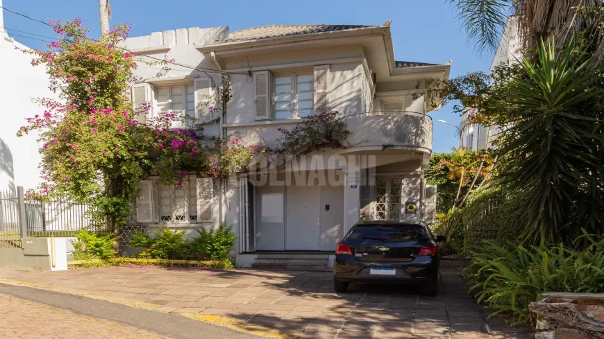 Foto 1 de Casa com 3 Quartos à venda, 157m² em Auxiliadora, Porto Alegre