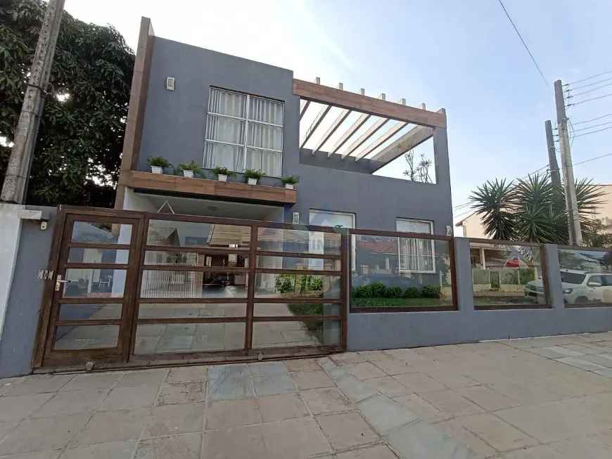 Foto 1 de Casa com 5 Quartos à venda, 257m² em Igra sul, Torres