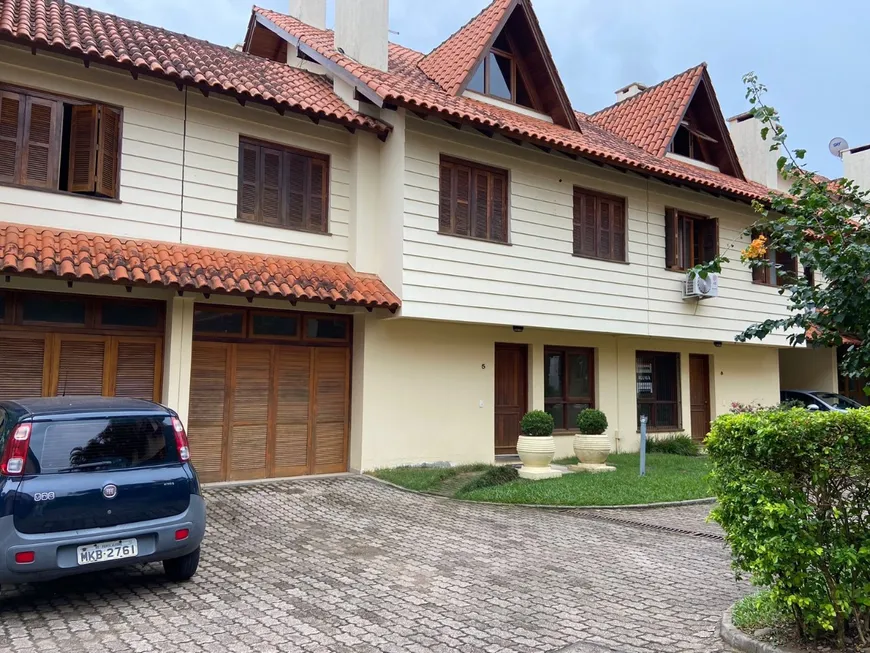 Foto 1 de Casa de Condomínio com 3 Quartos à venda, 157m² em Espiríto Santo, Porto Alegre