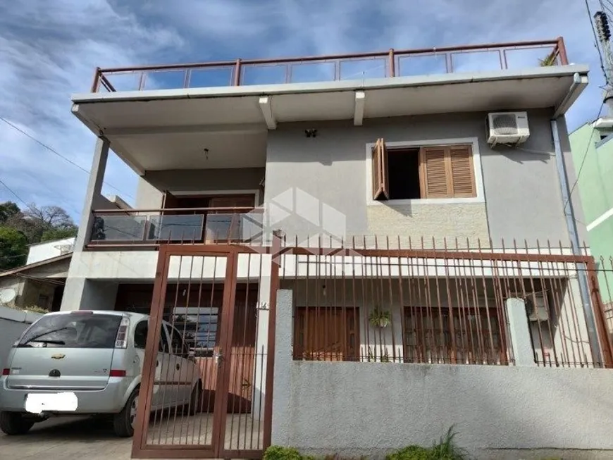 Foto 1 de Casa com 5 Quartos à venda, 420m² em Vila Nova, Porto Alegre