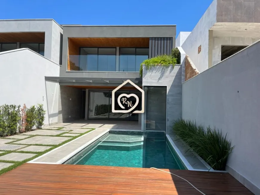 Foto 1 de Casa com 4 Quartos à venda, 320m² em Barra da Tijuca, Rio de Janeiro
