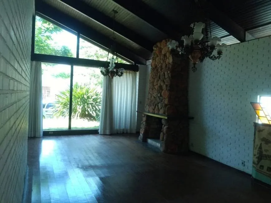 Foto 1 de Casa com 4 Quartos à venda, 280m² em Três Figueiras, Porto Alegre