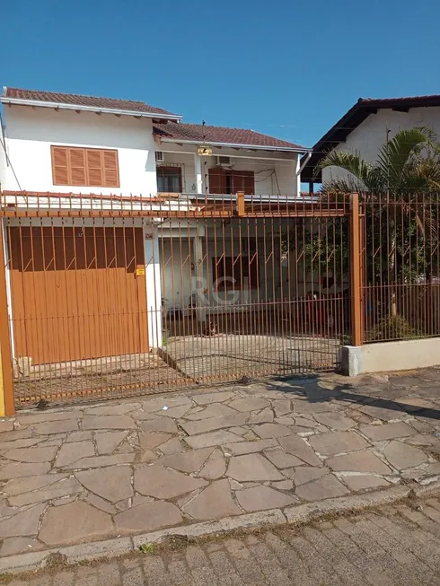 Foto 1 de Casa com 3 Quartos à venda, 179m² em Vila Nova, Porto Alegre