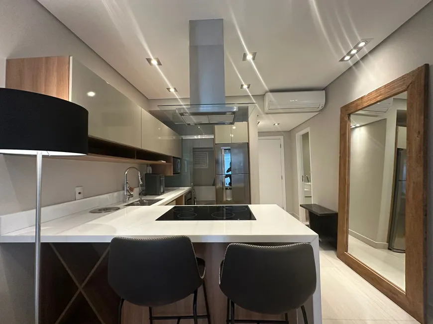 Foto 1 de Apartamento com 1 Quarto para alugar, 61m² em Itaim Bibi, São Paulo