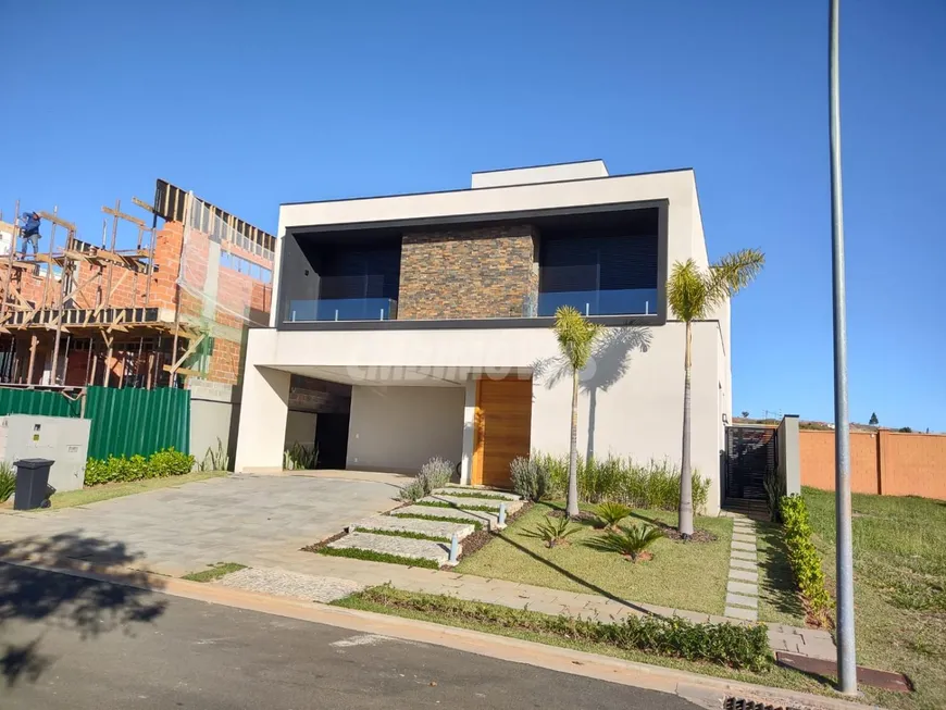 Foto 1 de Casa de Condomínio com 4 Quartos para venda ou aluguel, 400m² em Alphaville Dom Pedro 2, Campinas
