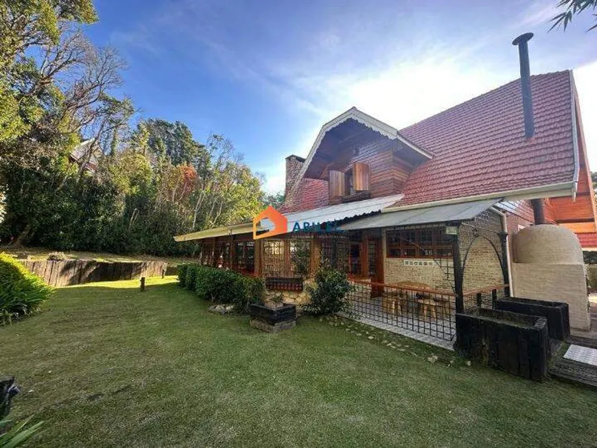 Foto 1 de Casa com 4 Quartos à venda, 486m² em Alto do Capivari, Campos do Jordão