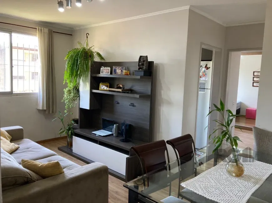 Foto 1 de Apartamento com 2 Quartos à venda, 60m² em Santa Fé, Porto Alegre