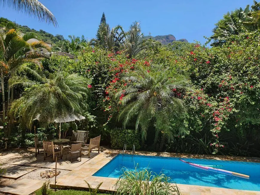 Foto 1 de Casa de Condomínio com 5 Quartos para venda ou aluguel, 460m² em Itanhangá, Rio de Janeiro