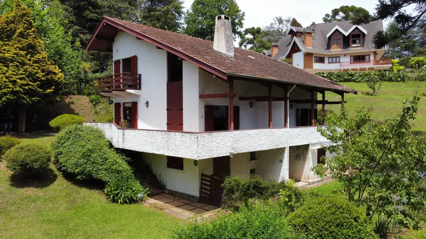 Foto 1 de Casa com 4 Quartos à venda, 392m² em Centro, Campos do Jordão