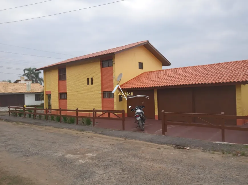 Foto 1 de Casa com 4 Quartos à venda, 205m² em Praia Paraiso, Torres