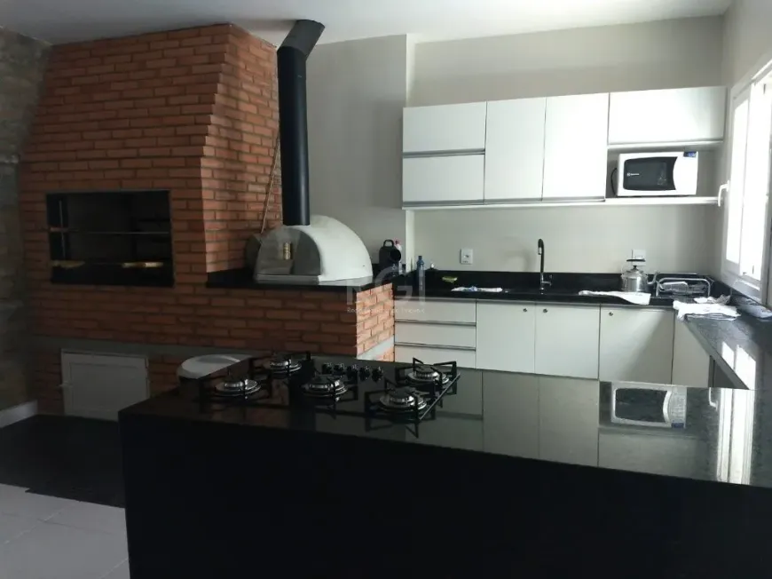 Foto 1 de Apartamento com 3 Quartos à venda, 76m² em Menino Deus, Porto Alegre