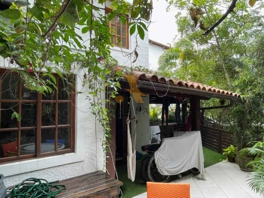 Foto 1 de Casa de Condomínio com 4 Quartos à venda, 157m² em Barra da Tijuca, Rio de Janeiro