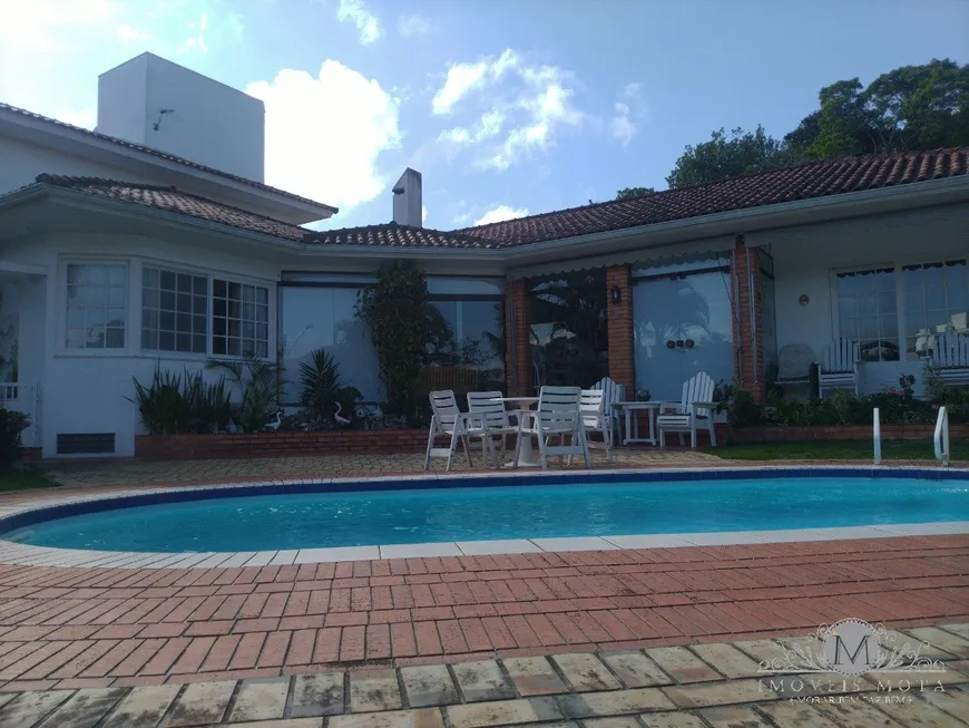 Foto 1 de Casa de Condomínio com 3 Quartos à venda, 310m² em Cacupé, Florianópolis