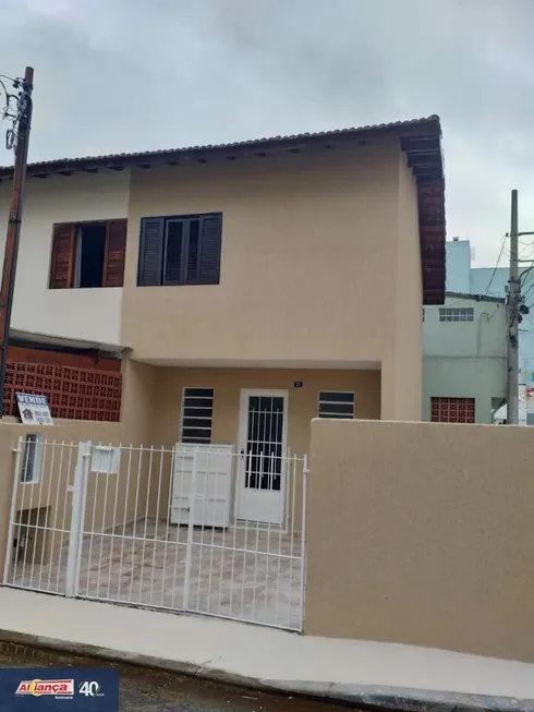 Foto 1 de Sobrado com 2 Quartos à venda, 90m² em Vila das Palmeiras, Guarulhos