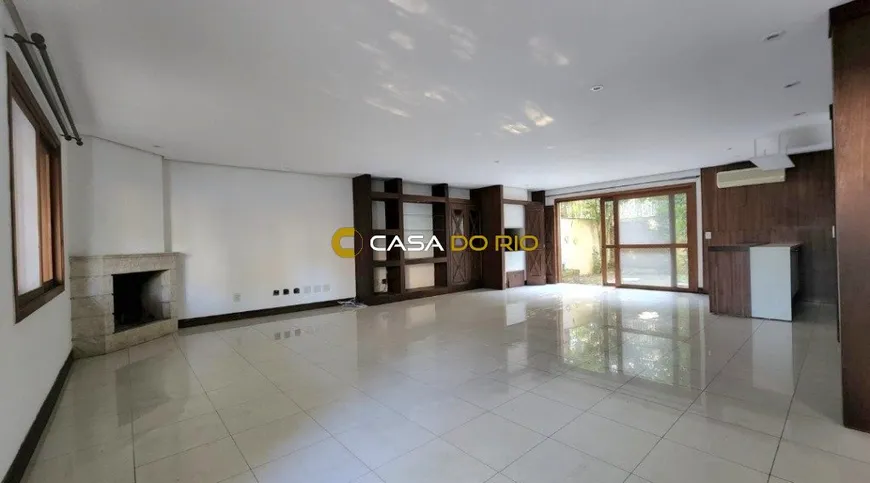 Foto 1 de Casa de Condomínio com 3 Quartos à venda, 390m² em Jardim Isabel, Porto Alegre