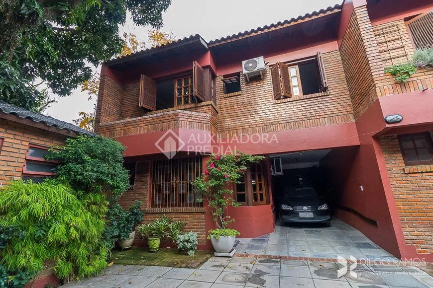 Foto 1 de Casa de Condomínio com 3 Quartos à venda, 178m² em Jardim Isabel, Porto Alegre