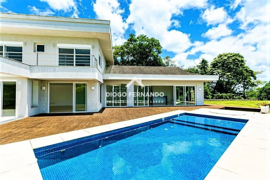 Foto 1 de Casa de Condomínio com 4 Quartos à venda, 1400m² em Cacupé, Florianópolis